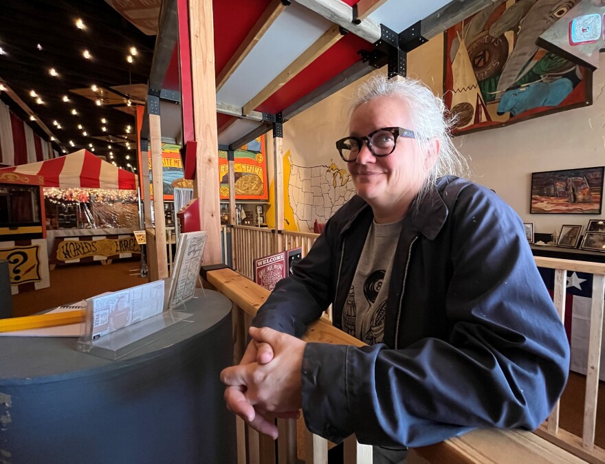 Erika Nelson stands at the entrance to her roadside expo, which she opened five years ago in the small town of Lucas. (Photo by David Condos, Kansas News Service)