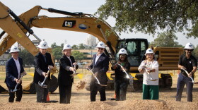 Waco City Council members and city officials turn over the ceremonial first shovel during the Barron's Branch groundbreaking ceremony on Thursday, September 24, 2026. The project is the first phase of a larger downtown redevelopment plan that could eventually include a ballpark district, a new convention center and a performing arts center.