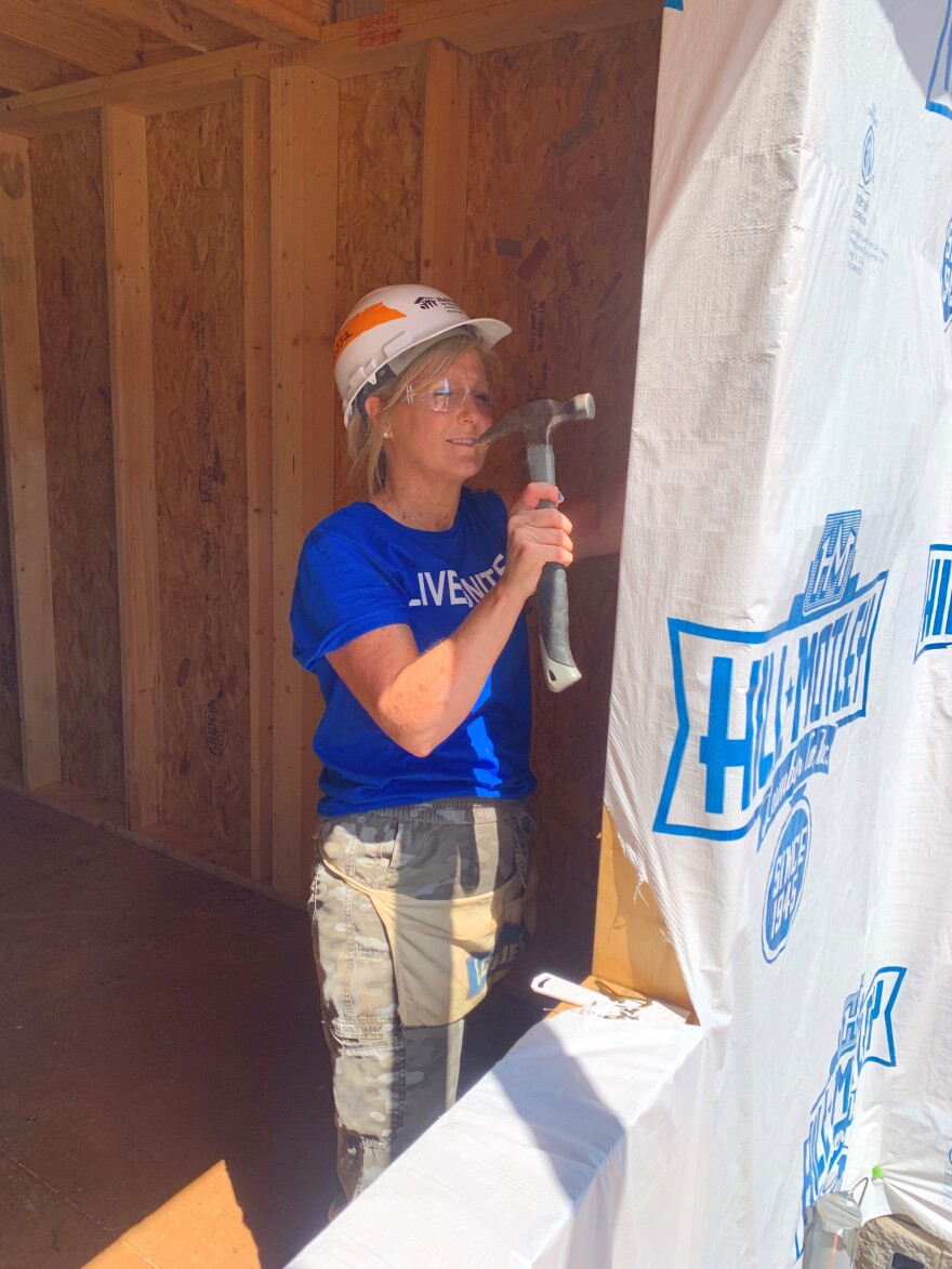 Melissa Stephanski, chief academic officer for Warren County Public Schools, volunteers with Habitat for Humanity.