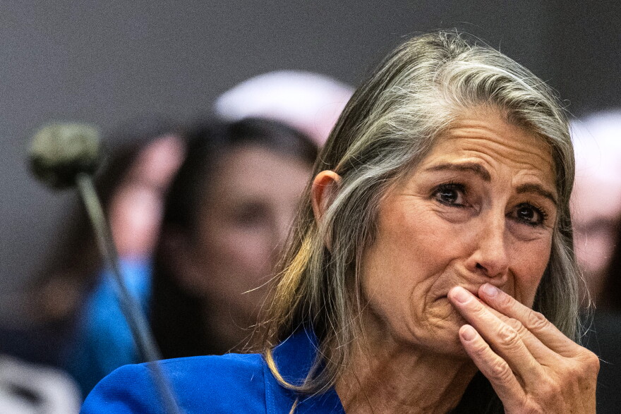 Former Colorado Bureau of Investigation forensic analyst Yvonne "Missy" Woods crying in court.