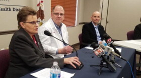 Champaign County Public Health Ditrict Administrator Julie Pryde (left) speaks at a news conference March 15 announcing the county's first confirmed COVID-19 case.