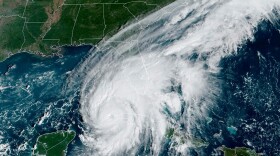 This GOES-East GeCcolor satellite image taken at 9:56 a.m. EDT on Tuesday, Sept. 27, 2022, and provided by the National Oceanic and Atmospheric Administration (NOAA), shows Hurricane Ian passing over western Cuba. Hurricane Ian tore into western Cuba on Tuesday as a major hurricane, with nothing to stop it from intensifying into a catastrophic Category 4 storm before it hits Florida, where officials ordered 2.5 million people to evacuate before it crashes ashore Wednesday.