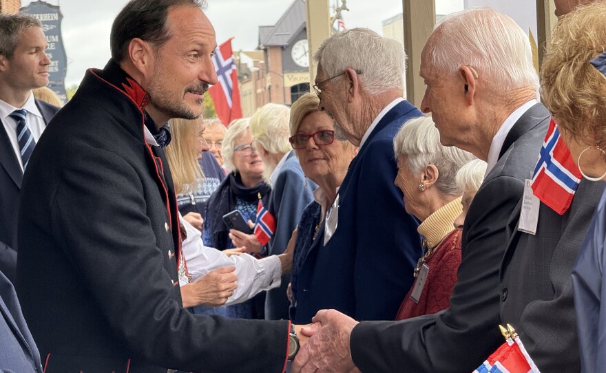 Crown Prince Haakon greets Iowans at a ceremony in Decorah.