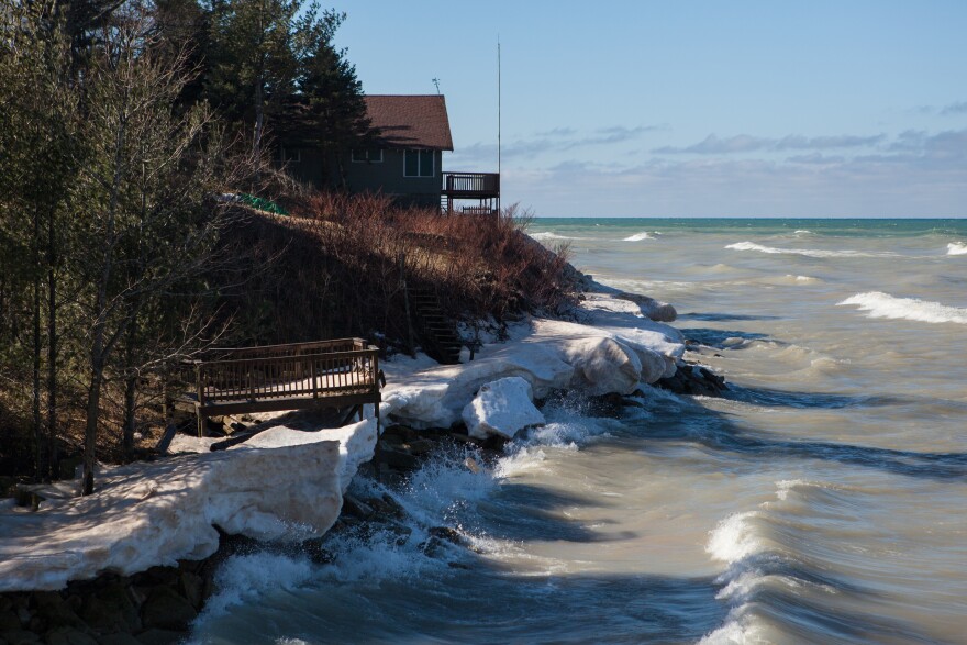 A home in Mears sits perched just off a rising Lake Michigan. According to the U.S. Army Corps of Engineers, the lake is expected to rise another eight inches by July.