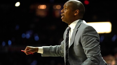 FILE - Arizona assistant coach Justin Gainey gestures during the second half of an NCAA college basketball game against Washington State on March 5, 2020, in Tucson, Ariz.