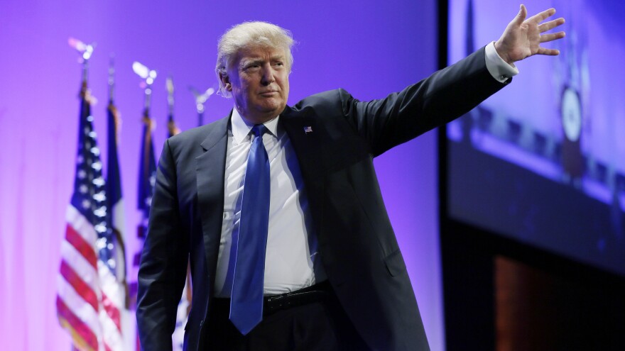 Donald Trump waves as he walks offstage after speaking at the Iowa Republican Party's Lincoln Dinner last month.