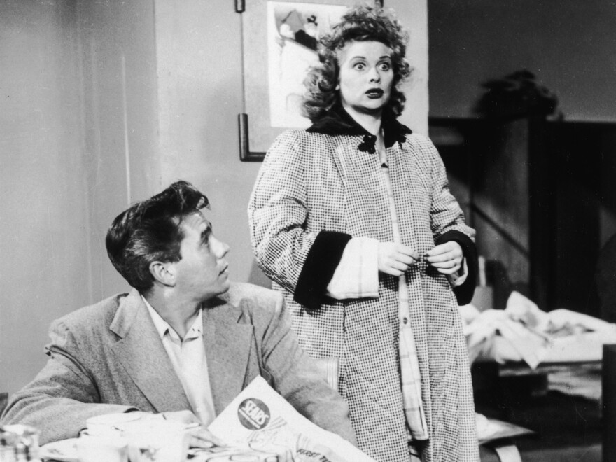 American actor Lucille Ball and Cuban-born actor Desi Arnaz star as a married couple in the television series, <em>I Love Lucy </em>in 1956. The pair were also married in real life.