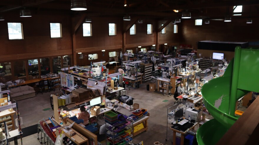 In this March 5, 2026 picture, the space where Softstar Shoes' elves work to create shoes is seen, including the slide between the first and second floor.