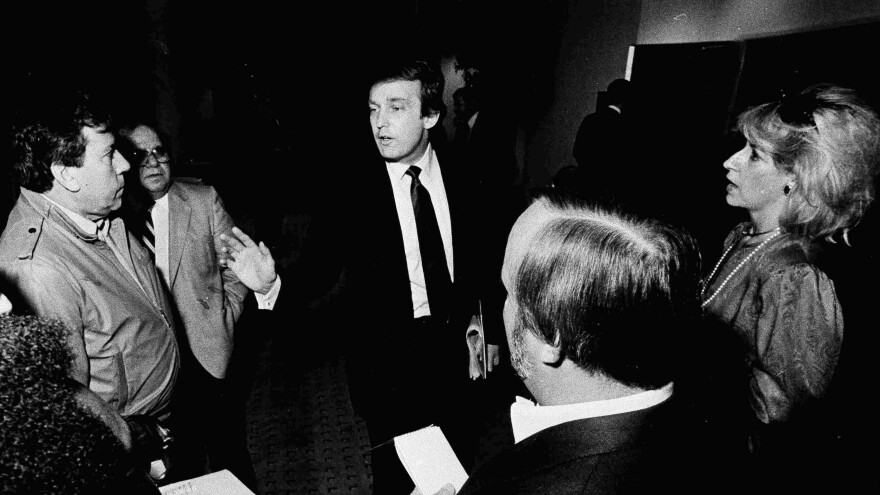 Donald Trump, owner of the United States Football League's New Jersey Generals, talks to reporters on Nov. 1, 1985, in Memphis, Tenn., during a break in the USFL owners' meeting.