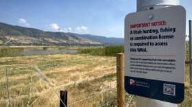 The Utah Department of Natural Resources has posted signs at Wildlife Management Areas like this one at Farmington Bay to let people know they need a license to recreate. July 24, 2025.