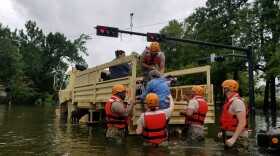 Texas National Guard soldiers conduct rescue operations in flooded areas around Houston, Texas 27 August, 2017. (Photo by 1Lt. Zachary West, 100th MPAD)