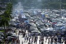Fans arrive to the stadium prior to a Copa America Group A soccer match between Argentina and Peru in Miami Gardens, Fla., Saturday, June 29, 2024. (AP Photo/Rebecca Blackwell)