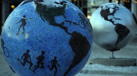Two globes that are part of the "Cool Globes"  exhibition about combating global warming and climate change in the Kongens Nytorv area in the center of Copenhagen.