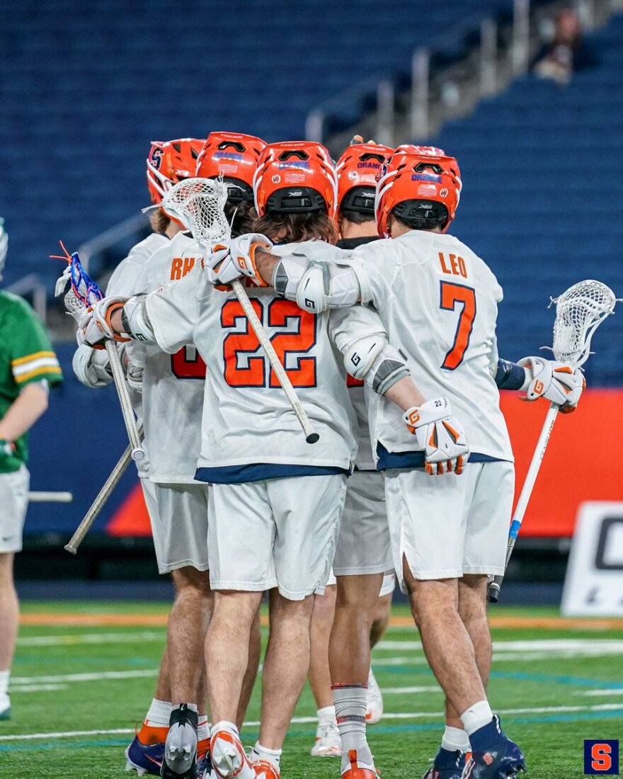 Joey Spallina (22, white) celebrates with teammates after goal