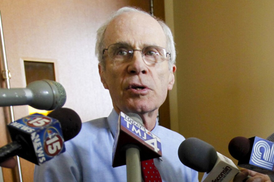 FILE - Wisconsin Secretary of State Doug La Follette speaks to reporters after a hearing on April 1, 2011, in Dane County Circuit Court in Madison, Wis. La Follette resigned on Friday, March 17, 2023 three months into his 10th consecutive term in office. Gov. Tony Evers appointed former Treasurer Sarah Godlewski, who ran for U.S. Senate last year but lost in the primary, to fill out the four-year term.