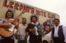 Conjunto musicians outside Lerma's Nite Club, 1602 North Zarzamora Street, San Antonio, Texas, early 1980s.