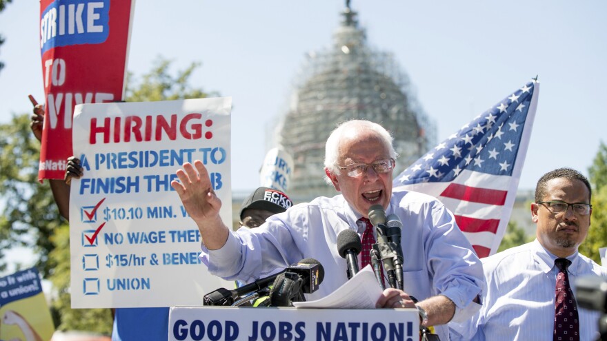 Democratic presidential candidate Sen. Bernie Sanders speaks during a 2015 rally to push for a raise to the minimum wage to $15 an hour.