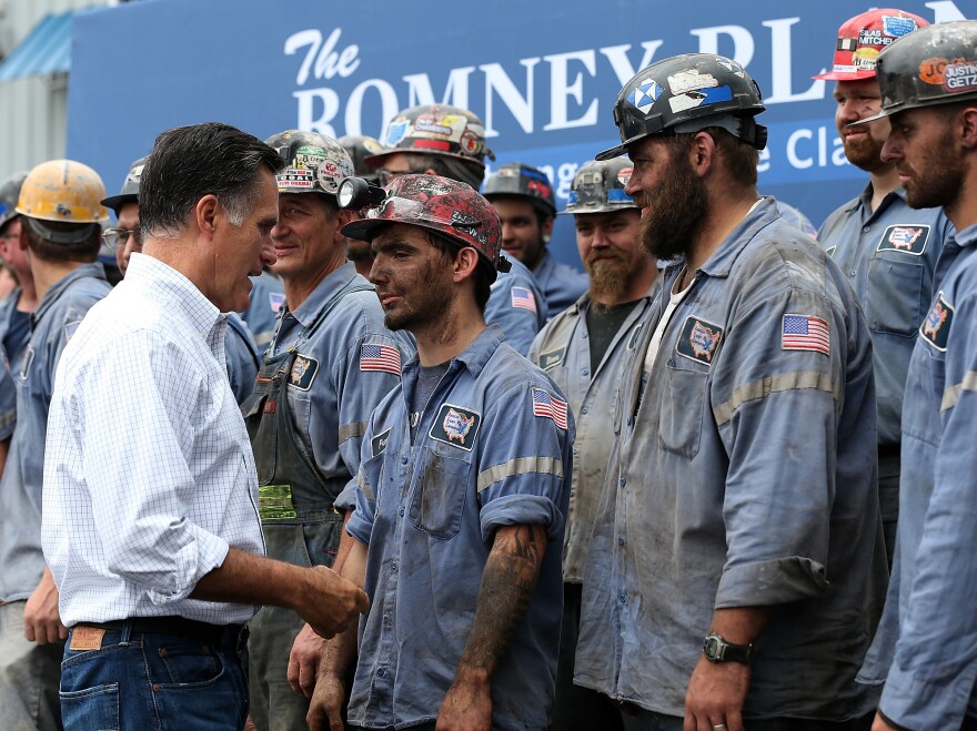 Republican presidential candidate Mitt Romney greets coal miners during a campaign rally in Beallsville, Ohio, on Tuesday.