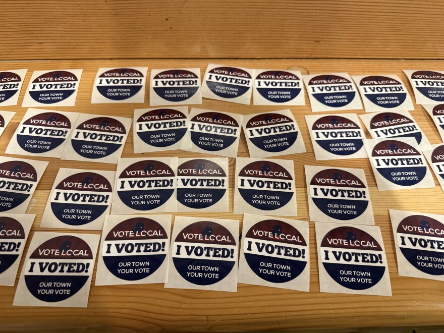 "I Voted" stickers line a counter inside Ursa Major Distilling near Ester, Alaska, on election day, Oct. 7, 2025.