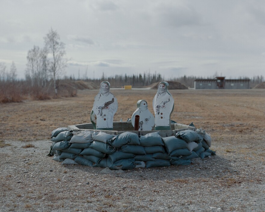 Targets resembling Middle Eastern combatants sit in a bunker at a Fort Wainwright shooting range in Fairbanks, Alaska. Commanders within the 11th Airborne Division said that prior to a regime change in 2022, years of fighting in desert wars had left soldiers questioning their identity as a unit, and the necessity of the added hardships of arctic training conditions.