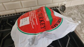 The American Farm Bureau Federation said the cost of a Thanksgiving dinner is down this year, thanks in large part to turkey prices.