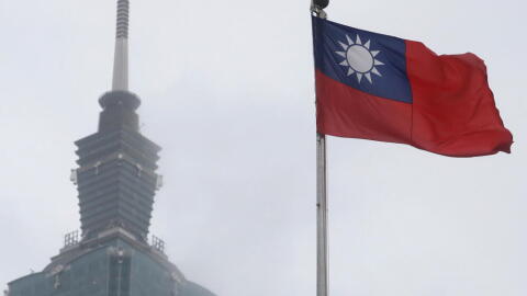 A Taiwan national flag flutters near the Taipei 101 building at the National Dr. Sun Yat-Sen Memorial Hall in Taipei, Taiwan, May 7, 2023. (Chiang Ying-ying/AP)