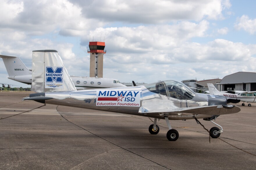 Midway High School's completed Tango Flight aircraft sits on the tarmac of the TSTC airport during the "First Flight Celebration" on Wednesday, May 20, 2026. Students built the plane from scratch over the last two years.