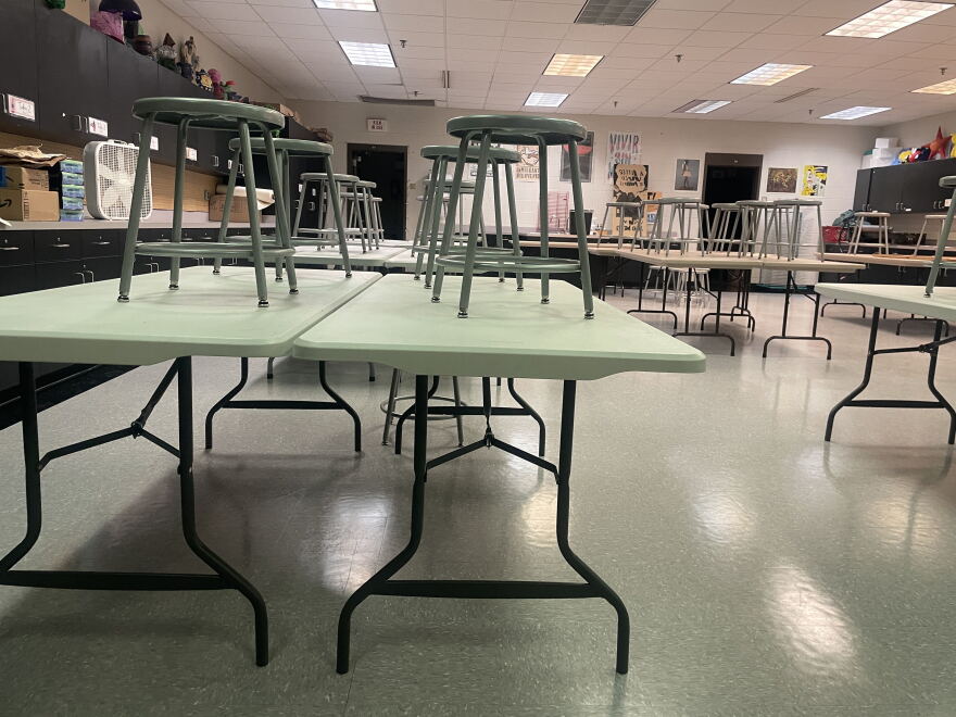 Folding tables in Paige Bauske's art classroom at Riverside University High School in Milwaukee. Students have used the temporary tables since the August 2025 floods.
