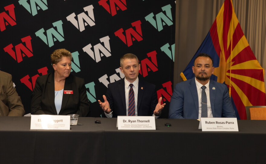 Elaine Groggett of Arizona Western College, Ryan Thornell, director of the Arizona Department of Corrections, Rehabilitation and Reentry, and Ruben Rosas-Parra, warden of the Arizona State Prison Complex-Yuma, pose for a photo during a news conference at Arizona Western College.