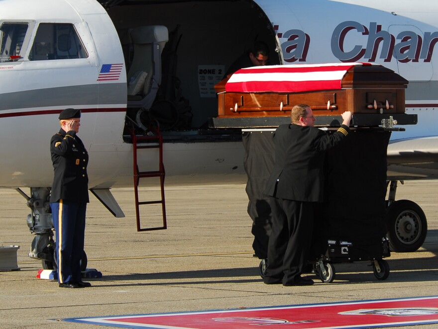 Tracy met Donna's coffin when it arrived in Fort Bragg, N.C.