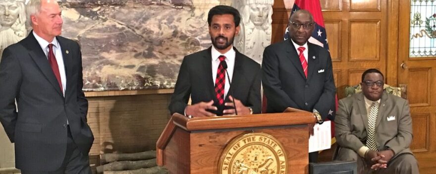 (from left) Gov. Asa Hutchinson, Mervin Jebaraj, assistant director of the Center for Business and Economic Research; Sherman Tate, state Urban League board chair; and Ken Wade, executive director of the Urban League of the State of Arkansas.