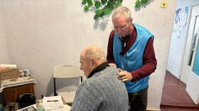 Colorado physician assistant Bob Downs treating a patient in Ukraine in December.