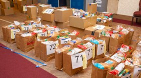 Kris Horlacher, Executive Director of Shoes 4 the Shoeless, says that providing families with three weeks of food at a time will help "flatten the curve" by providing food security and allowing people in need to venture out to stores less often.