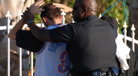 young man under arrest