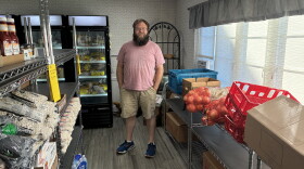 Coordinator Jacob Gordon stands in the Lion’s Share Food Pantry and Clothing Closet at St. Mark’s Lutheran Church in Roanoke.