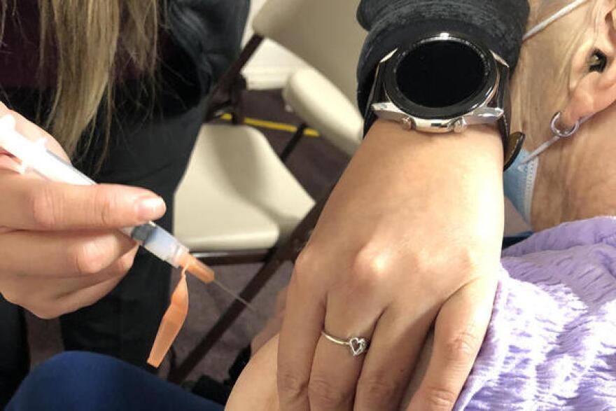The Biden administration's order requires vaccinations of all health care workers at facilities participating in Medicare or Medicaid. (Rebecca Green/WBOI)