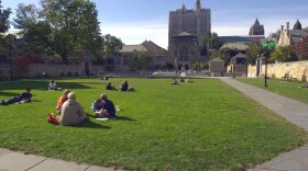 Yale University students and others spend a fall afternoon on Yale University's Cross Campus in New Haven, Conn., in an Oct. 11, 2000 file photo. (AP Photo/Bob Child/file)