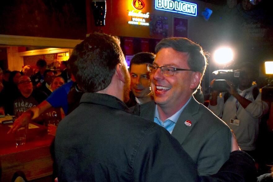 James Mueller hugs a supporter at Corby's Irish Pub after winning the South Bend mayoral election