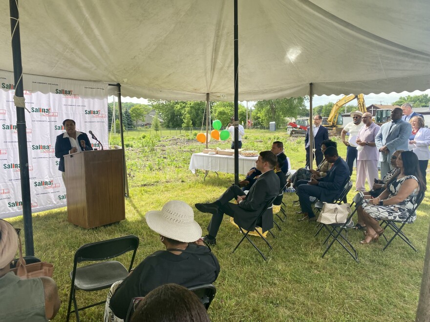 Syracuse Deputy Mayor Sharon Owens speaks to an audience at Salina First's ground breaking event.