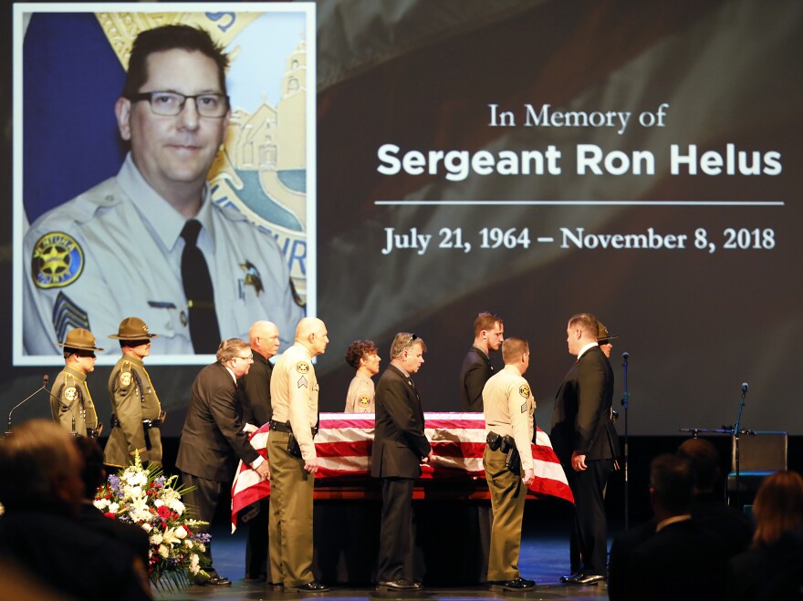 The casket of Ventura County Sheriff Sgt. Ron Helus arrives on stage for a memorial service on Nov. 15 in Westlake Village, Calif.