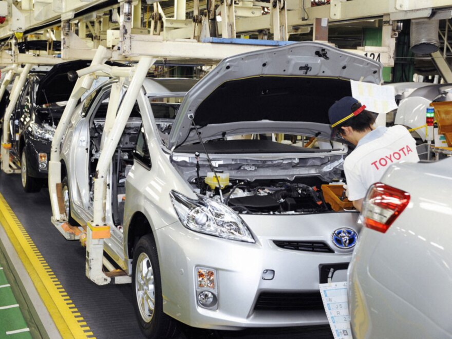 Toyota Prius models come off a Japanese assembly line in June 2009. Toyota officials said Wednesday that the company has received dozens of complaints involving the brakes in the latest Prius model.