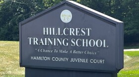 A sign for Hillcrest Academy calls it "a chance to make a better choice."