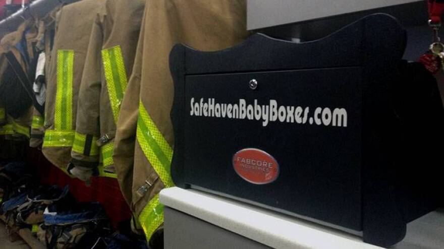 A prototype of the baby box sits on a counter in the Woodburn Fire Station just outside of Fort Wayne. The boxes are built into the walls of fire stations, police stations, hospitals or other qualified nonprofits, such as domestic violence shelters.