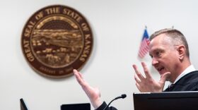 Douglas County District Court Judge James McCabria talks with attorneys during a March 6, 2026, hearing on the Kansas law that restricts transgender individuals to using their biological sex at birth on documents and which bathrooms they use in government buildings.