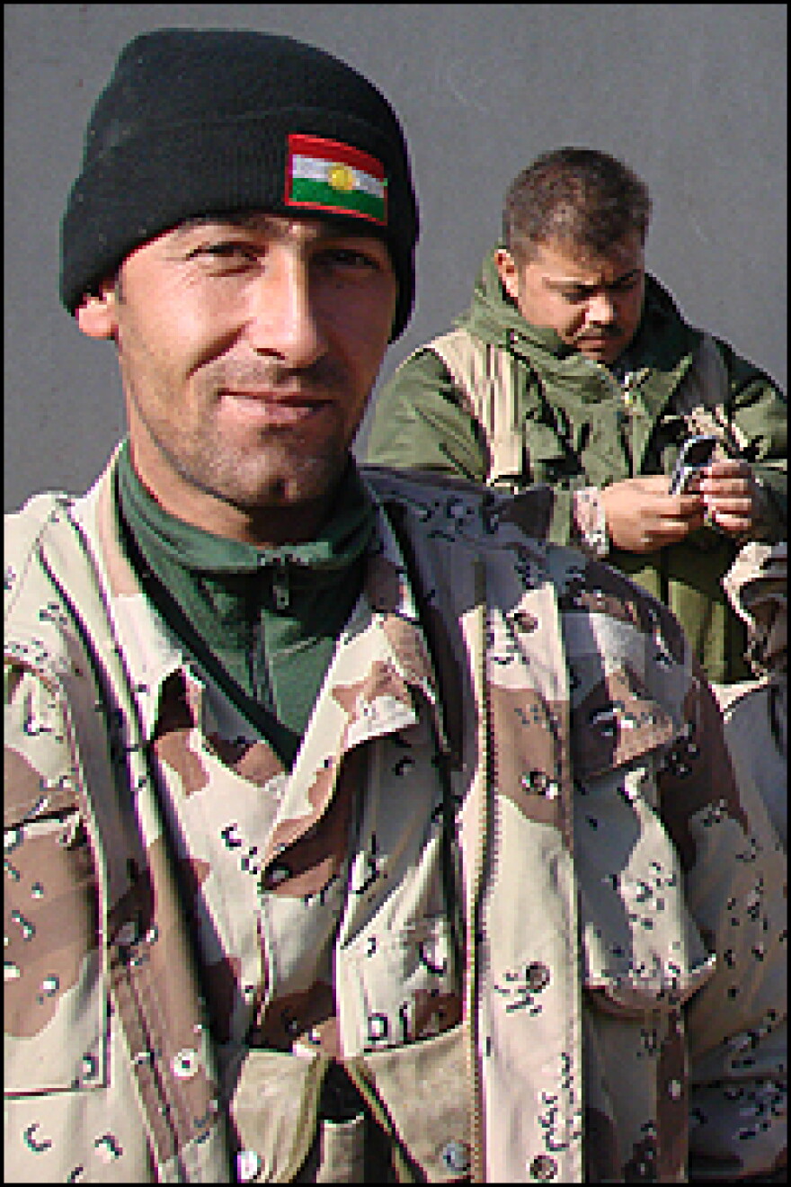 A Kurdish soldier proudly wears a wool cap with the flag of Kurdistan on it.  Last year, the President of the Iraqi Kurdistan region ordered the removal of Iraqi flags, which many Kurds see as a symbol of oppression.  This Iraqi Army base is one of the only places where you can see Iraqi flags on display in the entire Kurdistan region.