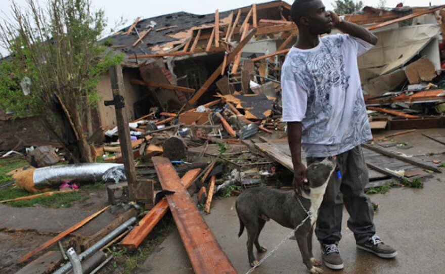 This man's dogs survived even though they were outside when his house was totaled.