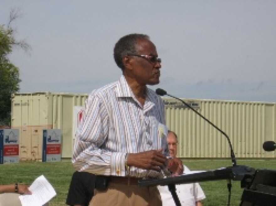 Kansas City Mayor Pro Tem Alvin Brooks addresses the crowd at Liberty Memorial to help build 10 houses to send to the Gulf Coast.