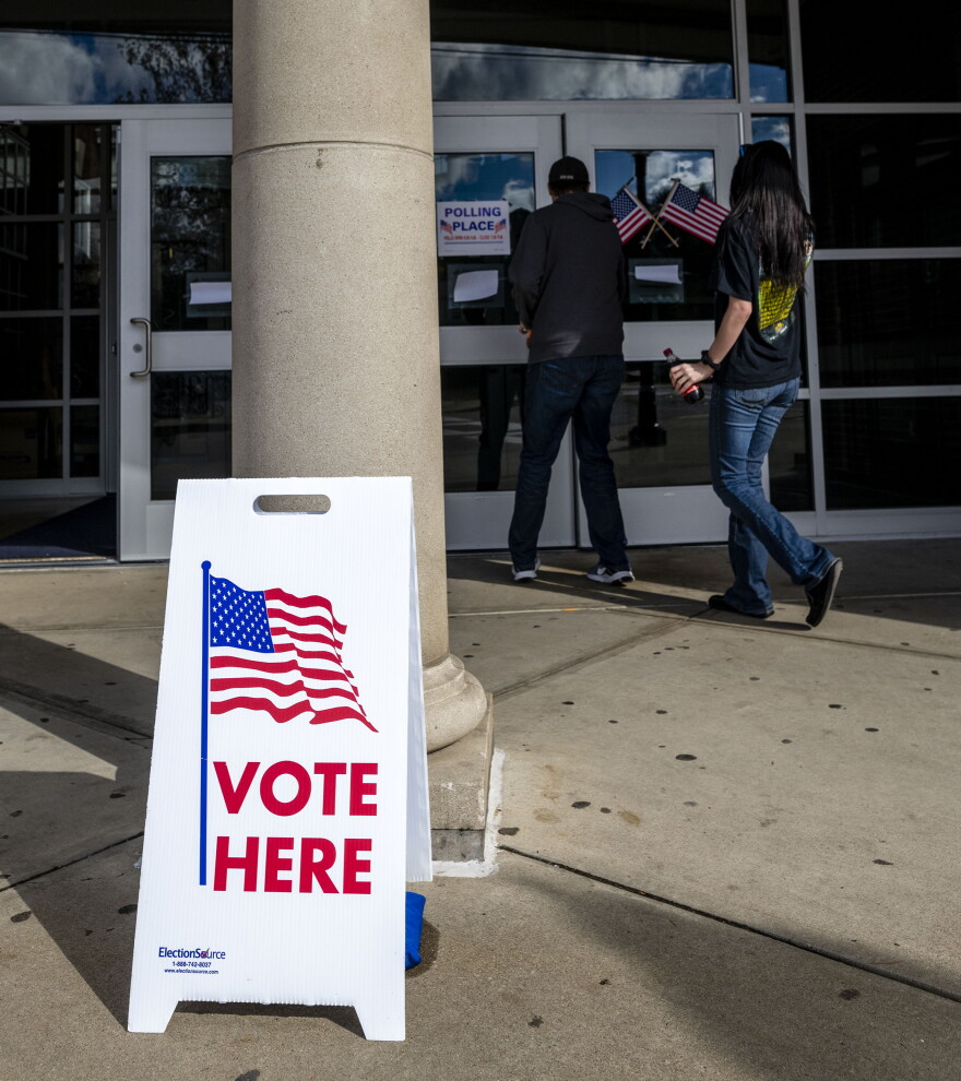 Voters enter the polling place at Morgantown High School on Nov. 6, 2018, in the South Park neighborhood of Morgantown, W.Va.