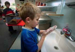 picture of school child washing hands