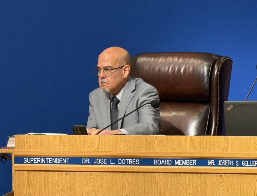Sat on the far left of the dais, Supterintendent Jose Dotres kept to himself as school board members went back and forth as they tried to establish the beginning of a timeline to search for a new superintendent.
